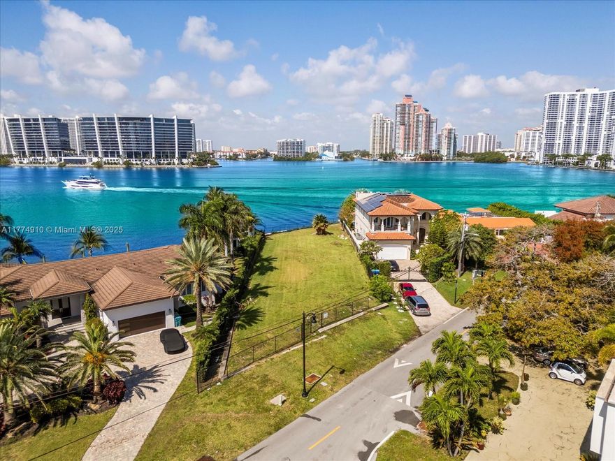 Discover the ultimate canvas for your dream home on this expansive 14,000 sqft lot nestled in the exclusive Golden Shores neighborhood. Boasting over 70 feet of pristine waterfrontage, this rare gem offers breathtaking open views that promise serenity and inspiration. Perfectly positioned adjacent to the vibrant Sunny Isles, you'll enjoy the ideal blend of tranquility and convenience. Seize this unparalleled opportunity to craft a bespoke residence in one of the most coveted locations—where luxury living meets natural beauty. Your waterfront masterpiece awaits!