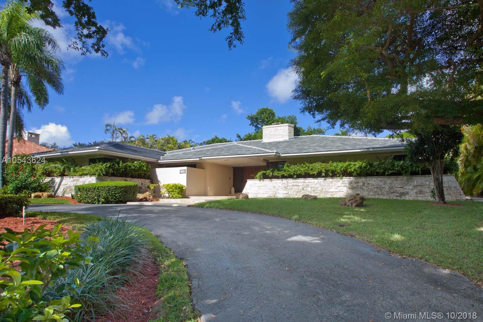 Rare find 1-story home in Cocoplum w/great floor plan sitting high on a ridge. The double door front entrance leads to foyer & living rm w/cathedral ceiling & Keystone faced fireplace. Formal dining rm w/privacy wall. In the bedrm wing of the home there are 4 bdrms w/wood flrs: 3 children&#x2019;s bedrms, 2 baths & a large master suite, 2 walk-in closets & bath suite w/separate spa tub & shower. On the other side, the eat-in kitchen w/granite counter tops, 2 wall ovens, wine cooler & microwave oven, opens to the large family rm, maid's quarters, laundry & spacious 2-car garage. Off the kitchen, the house features a large covered terrace w/Saturnia floors, built-in BBQ, large pool & beautiful garden. New 2017 roof, impact windows & doors except for front door. Full house 200 gal. diesel generator