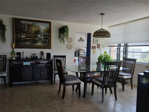Photo of 1100 Saint Charles Pl #712, Pembroke Pines, FL 33026 (MLS # A12058500)