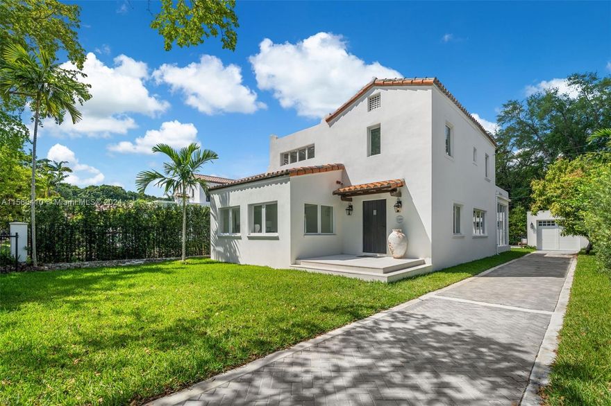 Step into refined luxury and modern living in this newly remodeled residence, nestled on a picturesque tree-lined street in North Coral Gables. This stunning home offers 4 bedrooms, 3.5 bathrooms, and a spacious, open floor plan. The living space flows seamlessly from the main living areas into the gourmet kitchen and glass-enclosed sunroom. An additional den space in the front adds to the charm and functionality of this home. Natural stone and oak floors, Viking appliances, white oak kitchen cabinets, and Restoration Hardware fixtures. Beautiful backyard with heated salt water pool. Fantastic location just a few blocks from the Granada Golf Course, Biltmore Hotel, schools, shops & restaurants. Actual living is 2517 Sq' and 2770 Sq' Total