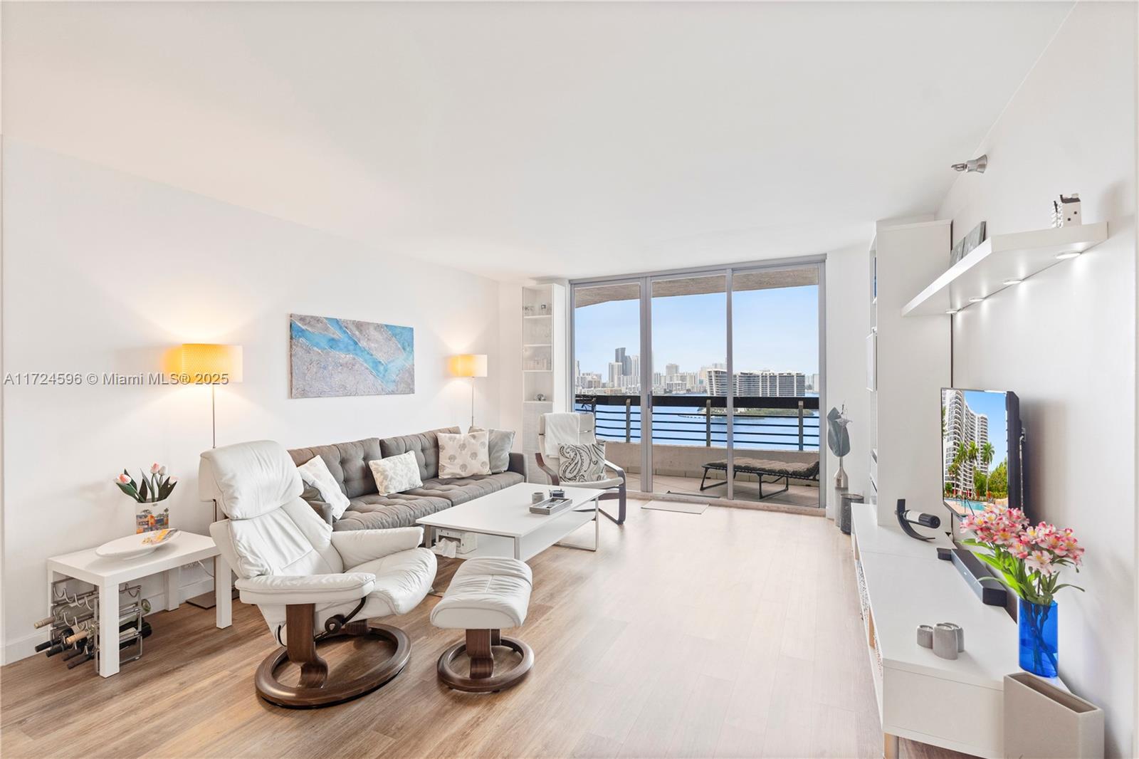 Experience luxury living with breathtaking intracoastal views from this beautifully remodeled condo. Enjoy both sunrises and sunsets from your balcony or your spacious primary bedroom, perfectly positioned to overlook the water. Water views from every window! The contemporary design features a stunning living room integrated with the dining and kitchen. This gem features a remodeled primary bathroom with dual vanity, plenty of closet space, and in-unit washer and dryer. Enjoy world-class amenities including a fitness center, pool, barbecue area, pickleball, tennis, restaurant, hobby room, basketball court, and more. Mystic Pointe is located close to the Aventura Mall, houses of worship, the beach, and Bal Harbour Shops. This home is a perfect blend of comfort and resort-style living!