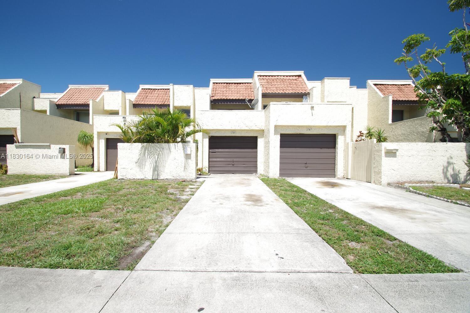 This spacious 3-bed, 2.5-bath townhome centrally located to everything! Designed for easy living, this townhome combines functionality with the laid-back charm of Florida living. Downstairs, you will enjoy a bright & airy living space with tile floors that lead you to an open kitchen. Upstairs, the master suite is your private sanctuary featuring a spacious bedroom & a walk-in closet! Two additional bedrooms provide flexibility for guests, a home office, or a cozy space for the family. Outside, a quaint patio is the perfect space to relax & is a great entertaining space. Here, you're just minutes away from sunny South Florida beaches, great shopping, fine dining & easy access to major highways.