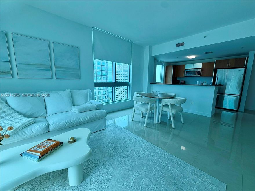 Discover this spacious 1-bedroom, 1-bath corner unit with stunning city and bay views. The unit features marble tile throughout, an Italian-designed kitchen, stainless steel appliances, and abundant natural light. Met 1 offers exceptional amenities, including a beautiful pool, jacuzzi, sauna, billiard and media room, and a fitness center with breathtaking views. Perfectly located within walking distance of five-star restaurants, a movie theater, Whole Foods, and with easy access to the Metromover. One parking space assigned