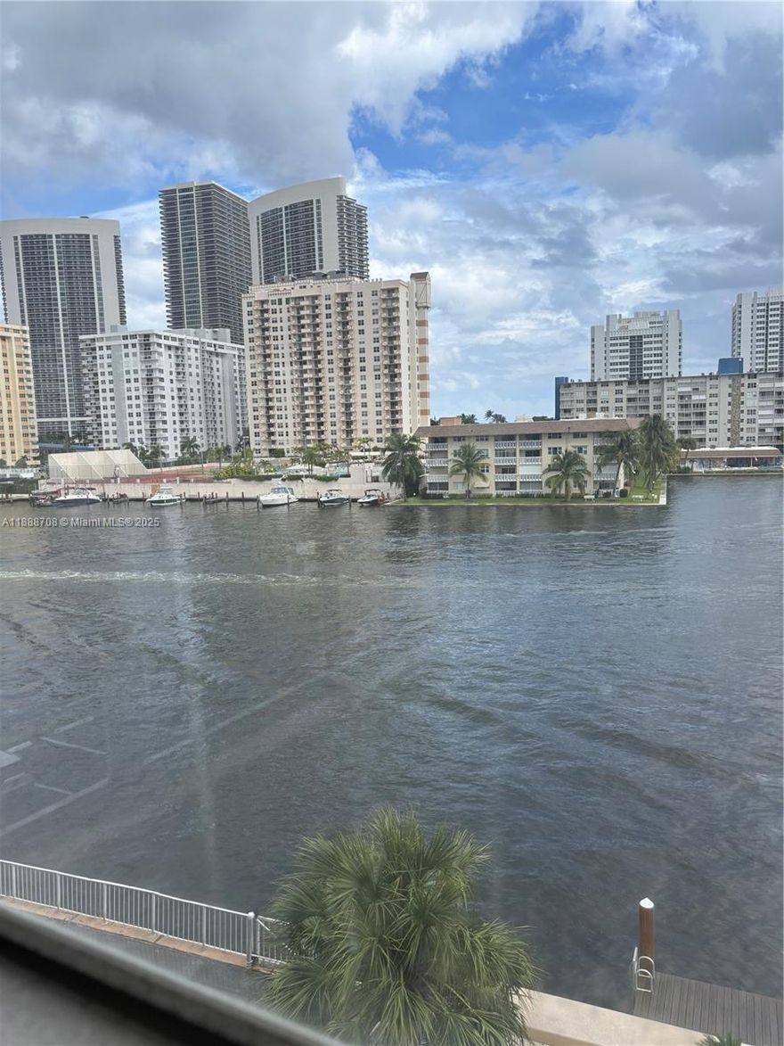 Beautiful wrap around intracoastal view! All ages are welcome! Corner unit with lots of privacy. Gated community with walking distance access to the inter coastal water. This exquisite spacious, one-bedroom, one-bathroom condo is located in an exclusive building that perfectly embodies the charm of the beach lifestyle. Large master bedroom with new wood plank floor, Large walk in closet. Eat in kitchen. Bathroom has just been remodeled. Water is included in the rent. Central A/C is only a few years old. Hurricane windows protection. The property also has secure parking and a community boat dock. Ideal for those seeking a peaceful retreat in Hallandale Beach. This condo provides convenient access to Gulfstream, Aventura nightlife, and a wide variety of dining options!