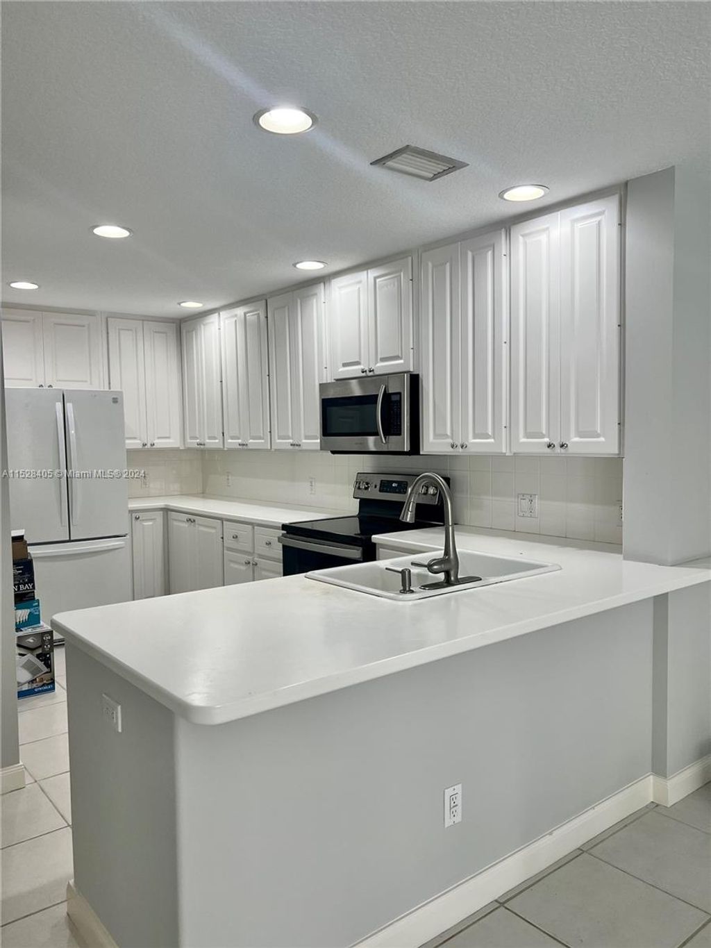 Photo of 1585 Jeaga Dr #0, Jupiter, FL 33458 (MLS # A11528405)