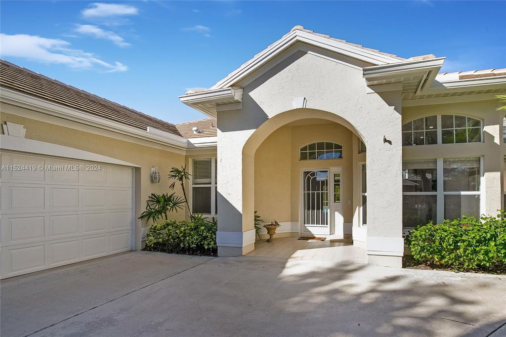 Photo of 1668 SW Monarch Club Dr #1668, Palm City, FL 34990 (MLS # A11524419)