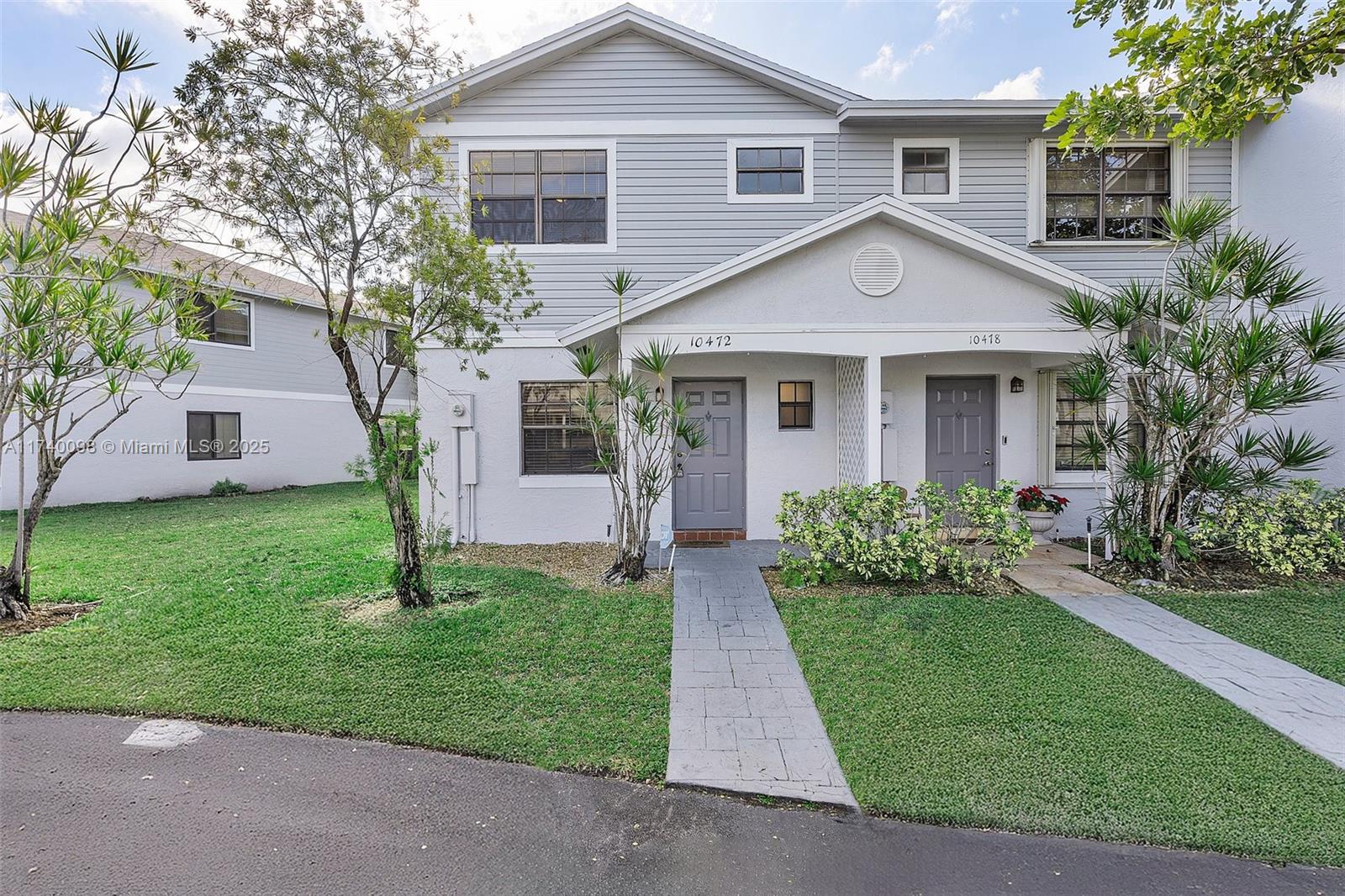 Discover this stunning 3-bedroom, 2.5-bathroom waterfront townhome, centrally located in Pembroke Pines. The roof was replaced in 2022, and the building's exterior was recently painted, ensuring a fresh and modern look. Step inside to find updated kitchen and bathrooms featuring modern finishes and fixtures. Enjoy the convenience of two reserved parking spaces and low HOA fees. The primary bedroom boasts custom closet organizers, providing ample storage space. Relax in the screened patio, perfect for enjoying serene waterfront views. This home offers a blend of comfort and style in a prime location.