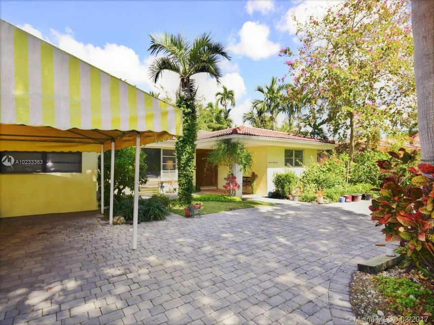 YOU WILL LOVE THIS FABULOUS MIMO RANCH! This spacious & charming home features an EXQUISITE floor plan with high ceilings, huge windows for lots of natural light, terrazzo floors, eat in kitchen & a bonus room + BRM. Huge light filled family room with walls of glass lead to a magnificent pool area that sits on a lush & large tropical yard. Located on a 10,000+sf lot & on one of the most beautiful streets in Shorecrest- 1 block from the bay and mins. from Miami Beach, The Design District & Miami Shores.