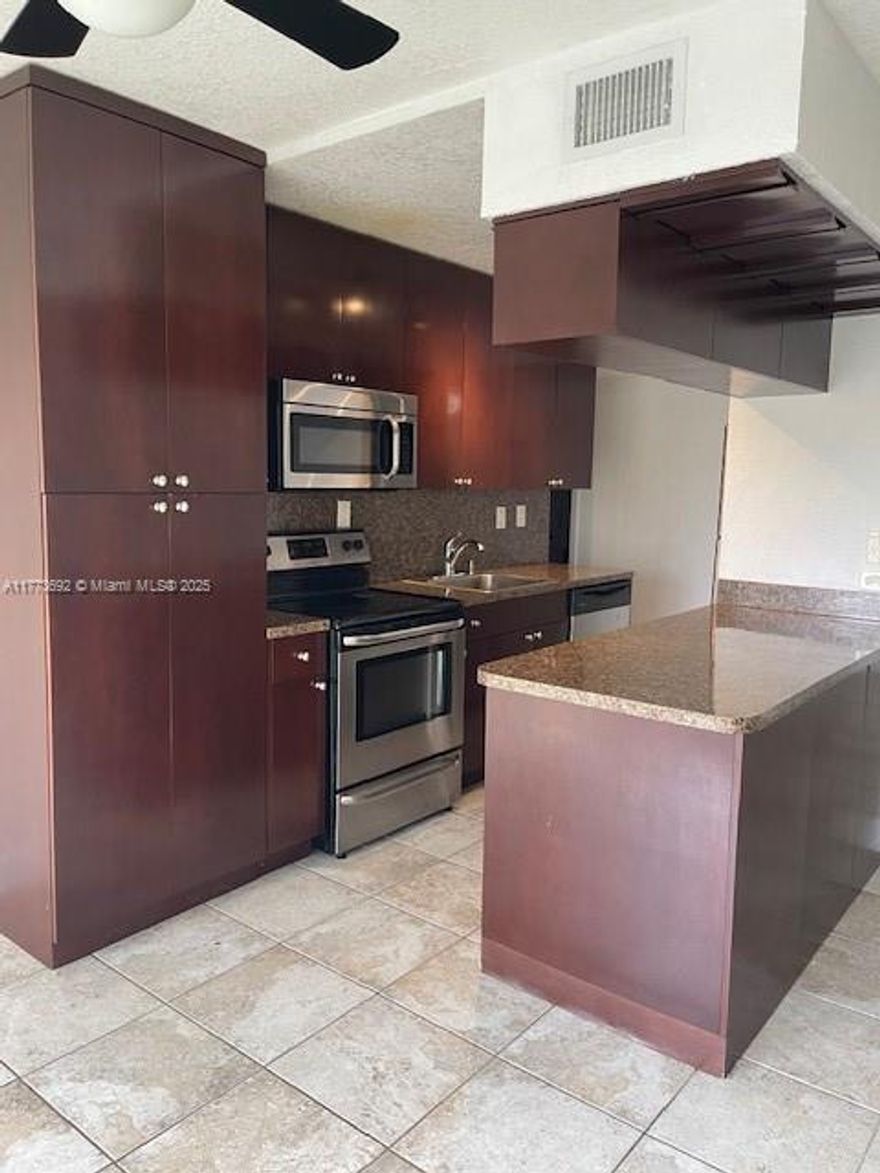 Huge price correction, call today!  Beautiful 2/1 condo for sale at Southwinds! Spacious layout with open kitchen, tile flooring and on-site laundry all within a gated community. Centrally located within minutes to dining, shopping and transportation. Low HOA makes this unit great for investment or as an end user. Call today to set up a showing!  Seller financing available, call for terms!