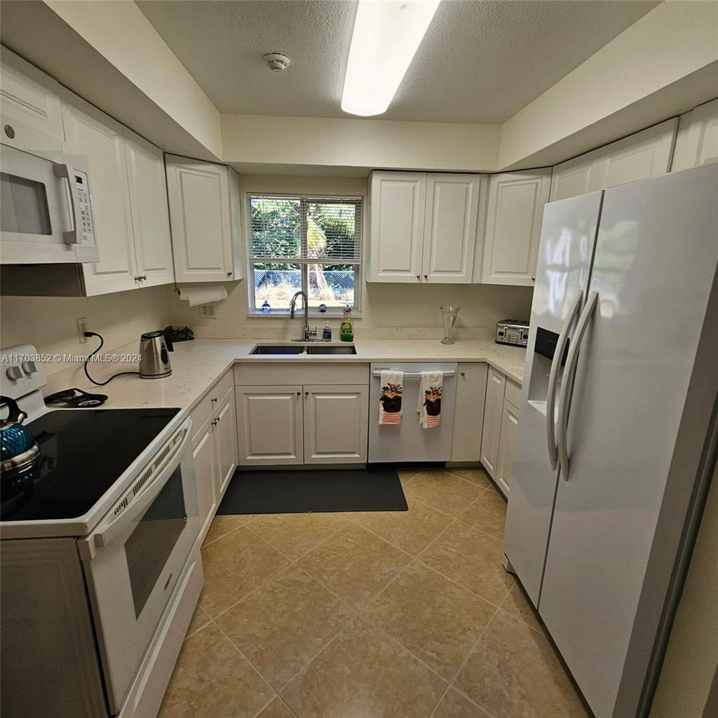 Photo of 10374 Sleepy Brook Way #10374, Boca Raton, FL 33428 (MLS # A11703852)