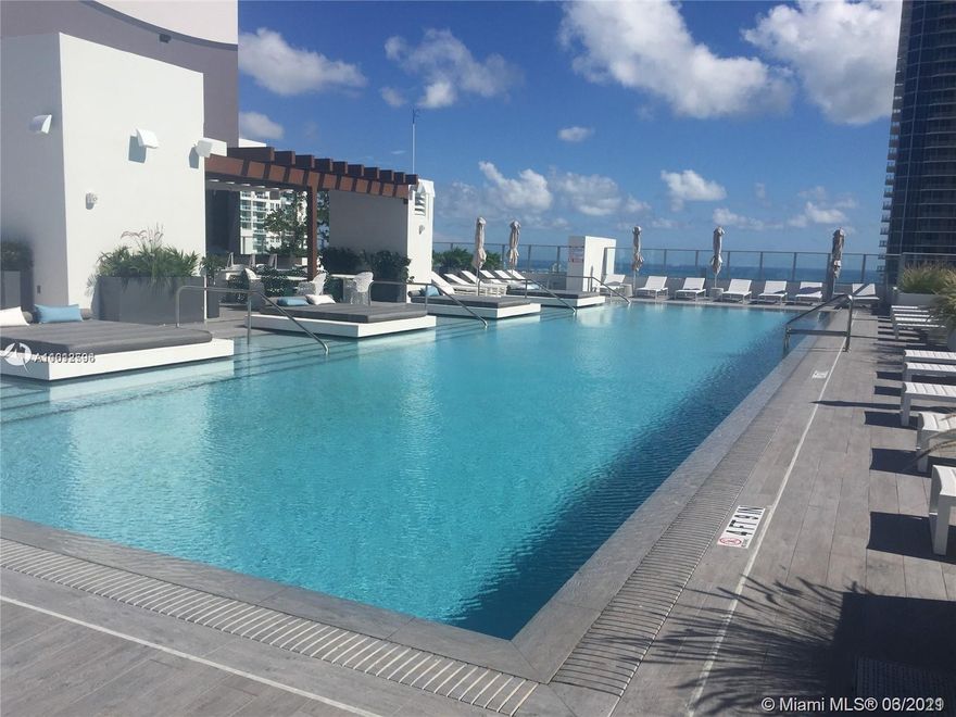 AMAZING 442 SQFT STUDIO UNIT IN THE HEART OF BRICKELL. CERAMIC FLOORS THROUGHOUT, STAINLESS STEEL APPLIANCES, SPACIOUS KITCHEN WITH PLENTY OF CABINET SPACE, MODERN BATHROOM WITH GLASS SHOWER, BALCONY OVERLOOKING THE CITY WITH AMAZING SUNSET VIEWS FROM THE 46TH FLOOR. 5 STAR AMENITIES CONDO WITH ROOF TOP POOL WITH SUNDECK AND BAR, INDOOR HEATED POOL, JACUZZI OVER LOOKING BRICKELL, STATE OF THE ART FITNESS CENTER, SPA FEATURING HAMMAM TURKISH STEAM BATH AREA, ACTIVITY ROOM WITH BOWLING, VIRTUAL GOLF, PING PONG, BILLIARDS, KIDS CLIMBING AREA, BASKETBALL COURT, RUNNING TRACK, RACQUET BALL, BBQ AREA AND MORE. UNIT COMES WITH 1 OPEN PARKING SPACE. BASIC CABLE & INTERNET INCLUDED. WALKING DISTANCE TO SHOPS, RESTAURANTS AND MORE.