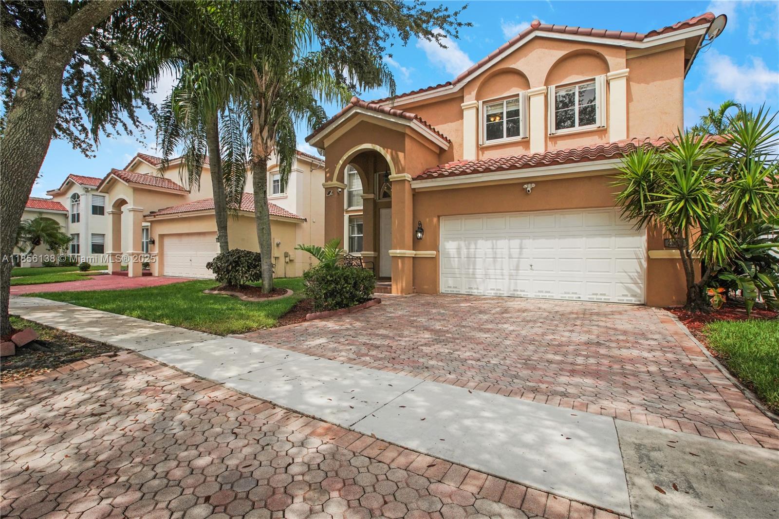 Step into this stunning 5-bedroom, 3-bath home that blends comfort and style. Featuring a newer roof (4 years old), it welcomes you with sleek laminate flooring and an elegant wrought iron stair rail for added sophistication.
The kitchen boasts granite countertops, perfect for cooking and entertaining. A brand-new custom wall unit with an electric fireplace, which creates a cozy focal point in the living area. Other upgrades include striking accent walls along the staircase and modern zebra blinds.
Enjoy the spacious laundry room with new washer and dryer. Hurricane shutters offer peace of mind, and a partial lake view adds a serene backdrop.
Don’t miss your chance to own this well-maintained, move-in ready gem. Schedule your tour today!