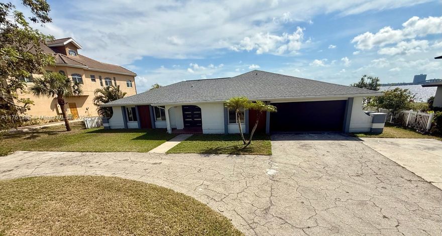 Unique Opportunity in North Fort Myers! Discover this stunning 2,549 sqft home in the exclusive North Shore Avenue neighborhood! This beautiful property boasts 4 bedrooms, 2 of them are master. Plus a versatile den or office space. Open design that perfectly blends comfort and elegance. Everything is new in this house: kitchen cabinets, top of the line appliances, porcelain floors, 3 bathrooms, all impact windows and doors, recently installed new shingle roof. Beautiful in ground pool and private boat dock on the Caloosahatchee River right on
 your backyard and open waterway directly to the Gulf of Mexico. A must see!