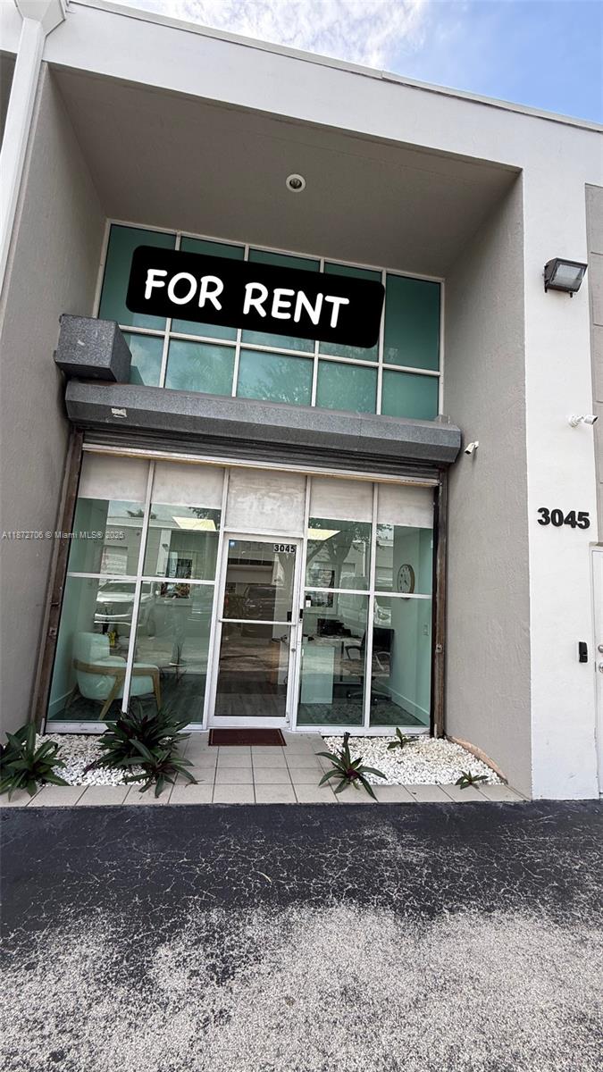 Renovated Warehouse with office space in the heart of Doral, minutes from City Place and with easy access to the Palmetto and 836. Totaling 2,100 sqft, the unit has +/-800 sqft of warehouse space and +/-1,300 sqft of office space, including a welcoming entry area. Two A/C units, one for office's area and other for the warehouse was replaced in 2022. it is powered with 220V and triphasic lines. The office renovation is comprehensive, and the sale includes all office furniture. The unit also comes with 3 assigned parking spaces. PLEASE CALL LISTING AGENT