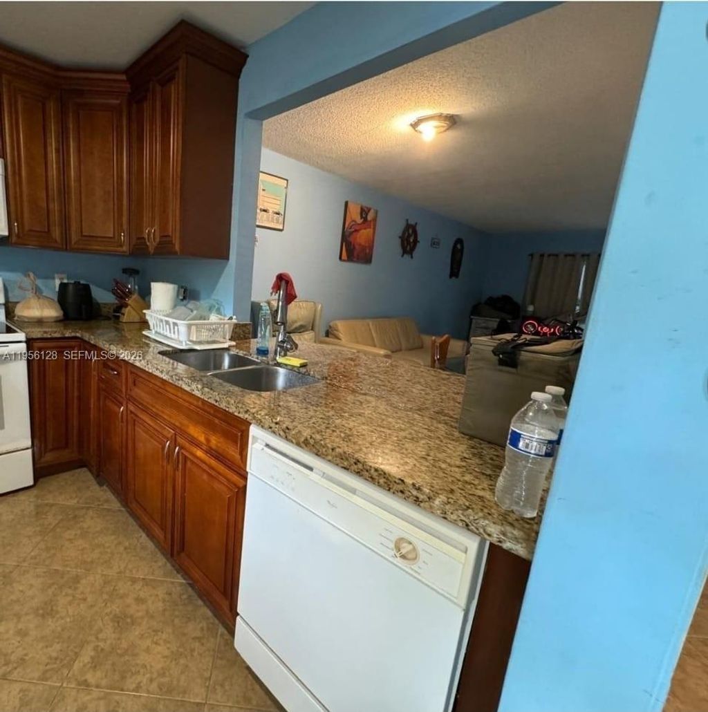 Photo of 4321 NW 9th Ave #104, Deerfield Beach, FL 33064 (MLS # A11956128)