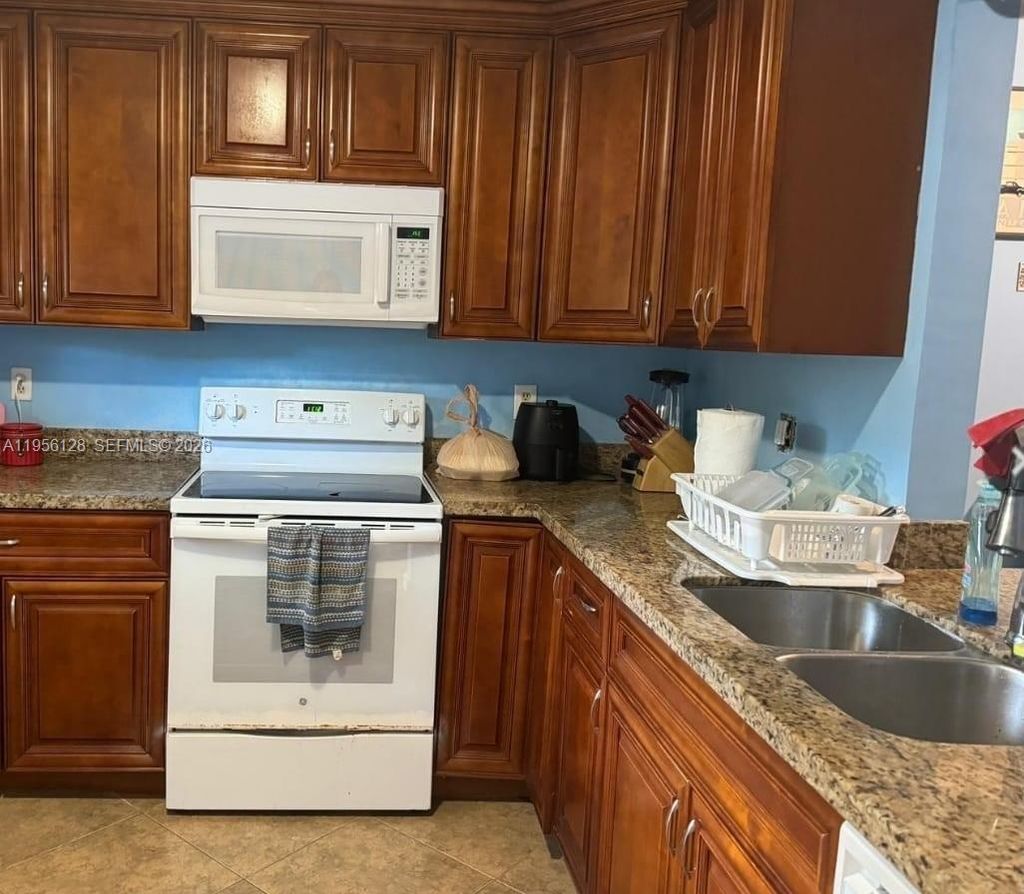 Photo of 4321 NW 9th Ave #104, Deerfield Beach, FL 33064 (MLS # A11956128)