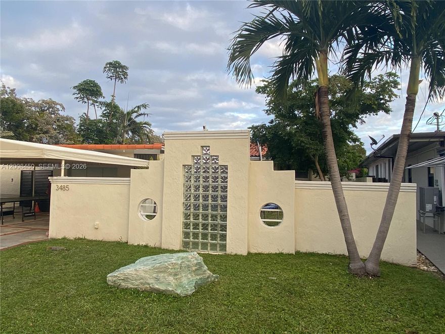 Waterfront property on private tree-lined street in Mid-Beach.  8800 Sqf.t lot, 55 Ft of water frontage.  One fixed bridge to open water with 9 foot clearance. Right off I-195, next to St. Patrick Church, this location is spectacular.  2 minutes to hop on 195 means you are minutes from Midtown, Downtown, Brickell and Airport.  Walkable to the beach, shops, restaurants, schools and houses of worship.  Property is at the end of a dead-end street with no neighbors on the north side.  Home is partially renovated with new roof and plumbing, renovated kitchen and baths.  Original Terrazzo floors throughout.  Opportunity to renovate and add square footage or build your dream home.  Small neighborhood with mix of art deco and modern homes.