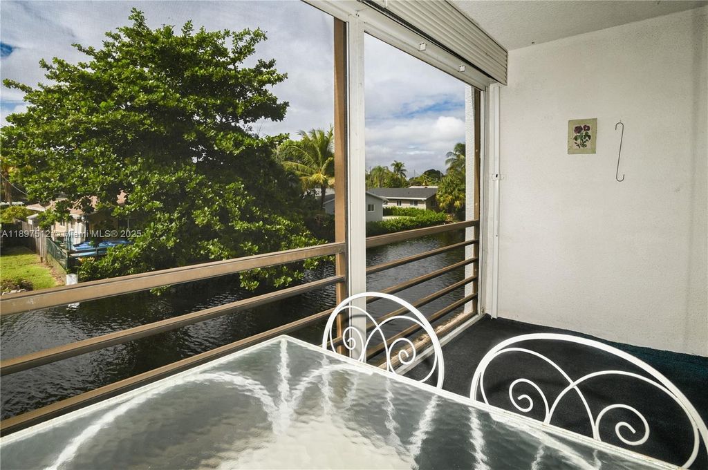 Photo of 110 Royal Park Dr #2H, Oakland Park, FL 33309 (MLS # A11897512)