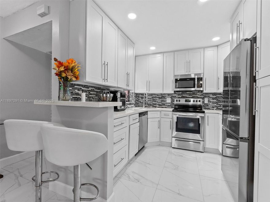 Welcome to this beautifully renovated condo in the family-friendly Applewood II community of Coconut Creek. This newly renovated home boasts a spacious layout, modern finishes, and a sleek kitchen with stainless steel appliances and quartz countertops. The updated bathroom and generous living areas provide the perfect balance of style and comfort, while the private balcony offers a peaceful outdoor retreat. The community has excellent amenities, including pools, fitness centers, and well-maintained grounds. The condo is ideally located near top-rated A-schools, major highways, and just minutes from the Coconut Creek Promenade, Tradewinds Park, and Butterfly World—offering easy access to shopping, dining, and outdoor recreation. This home combines modern living with an unbeatable location.