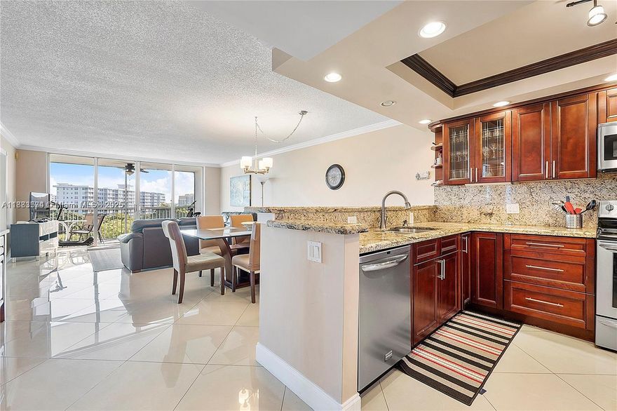 Wow! Beautiful Corner Unit W/ Breathtaking Lake Views From Balcony & All Bedrooms At Palm Aire Country Club. This Beautifully Designed Home Boasts A Split Floorplan/Porcelain Plank Tile Flooring Throughout. The Upgraded Kitchen Features Granite Countertops, Wooden Cabinets W/ Pantry, Stainless Steel Appliances, Garbage Disposal, & Dishwasher. Spacious Dining & Living Room W/ Recessed Lighting & Crown Molding Throughout. Large Balcony W/ Sliding Doors Offers Spectacular Views. Master Bedroom Has A Walk-In Closet, Storage Closet, & Full Shower W/ Glass Frame. Ceiling Fans In Every Room. Association Fee Covers Building Exterior, Amenities, Roof, Common Areas, & Insurance. Right Next To The Pool! Property is Furnished. A Must See!