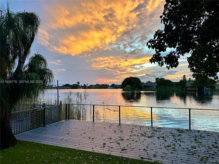 Completely renovated turnkey 3 BR 2 bath home on an absolutely stunning and swimmable lake!! All modern upgrades, all new appliances, quarts countertop, hurricane impact windows, NEW AC, screened patio, and brand new deck to enjoy magical sunsets! No HOA!!! Centrally located, 5 minute drive to Hard Rock Casino, Minutes from the 95 and Turnpike!