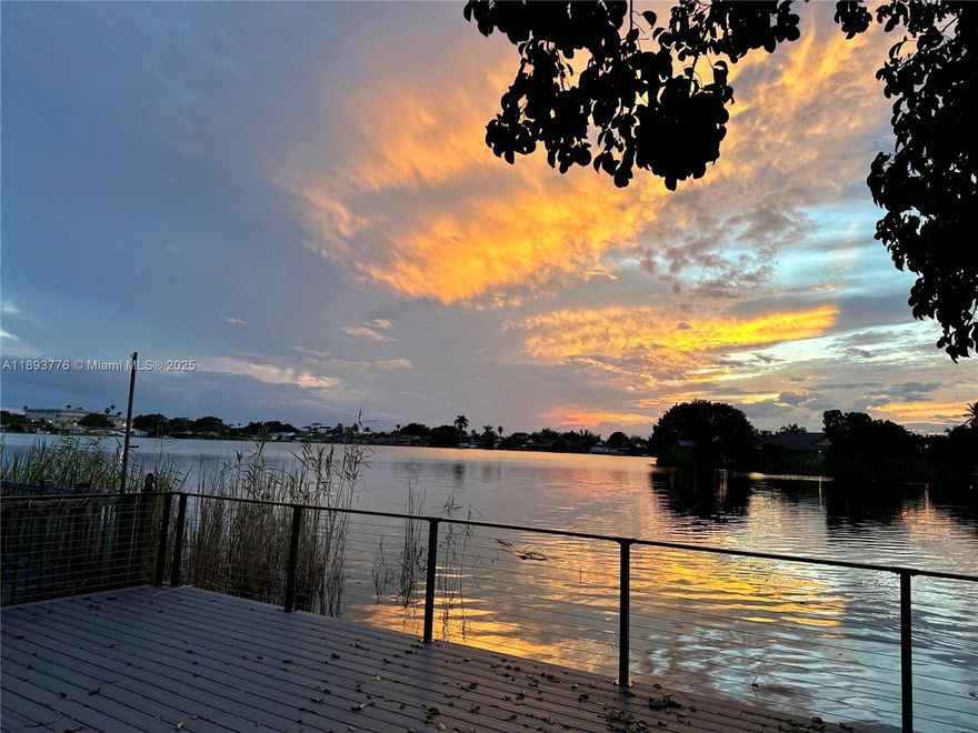 Completely renovated turnkey 3 BR 2 bath home on an absolutely stunning and swimmable lake!! All modern upgrades, all new appliances, quarts countertop, hurricane impact windows, NEW AC, screened patio, and brand new deck to enjoy magical sunsets! No HOA!!! Centrally located, 5 minute drive to Hard Rock Casino, Minutes from the 95 and Turnpike!