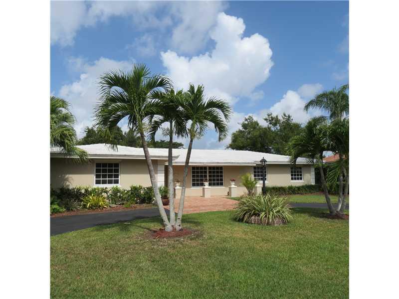 Palmetto Bay opportunity on quiet street in great school district. Lovingly maintained Jennings built 4 bdrm/ 2 bths home, & eat in kitchen. Family room, kitchen, dining room, & master open out to pool/ patio with sliding glass door. Kitchen has been remo deled with wood cabinetry & stainless appliances. Separate laundry room, & huge additional room that can be used as office, playroom, gym, etc. Spacious yard with large storage shed has side entrances perfect for boats. Bright and open floor plan.