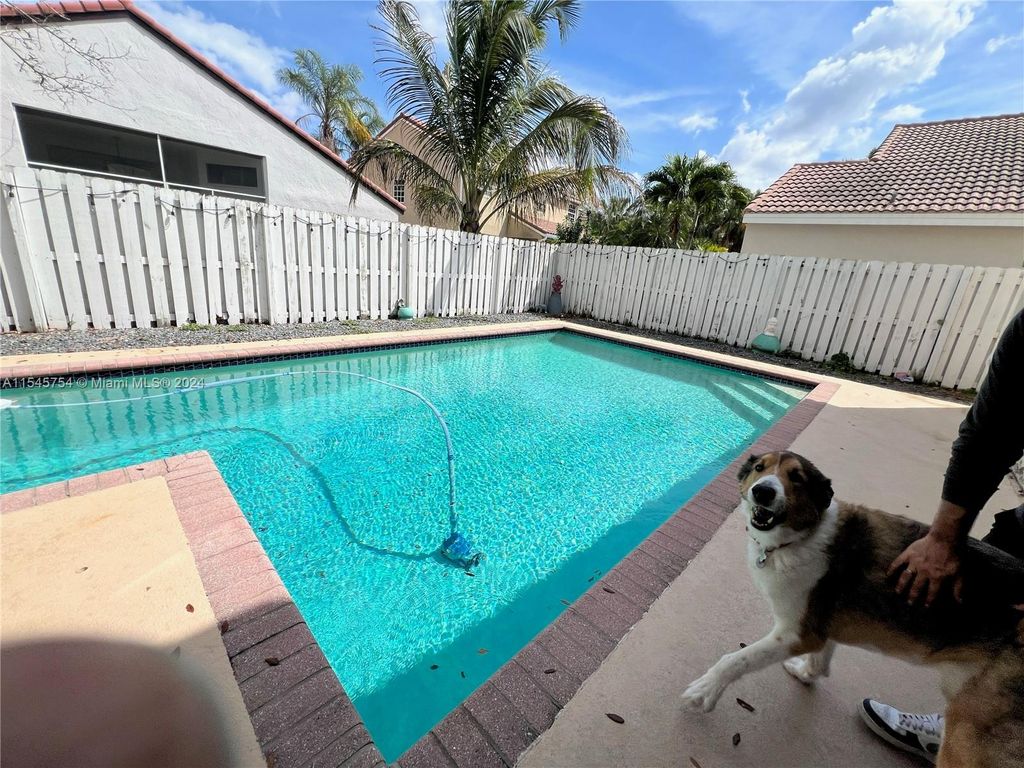 Photo of 300 Cameron Dr, Weston, FL 33326 (MLS # A11545754)