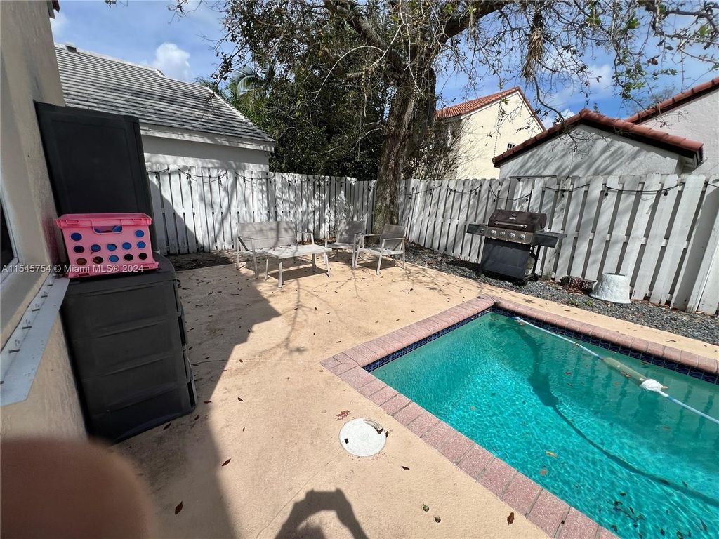 Photo of 300 Cameron Dr, Weston, FL 33326 (MLS # A11545754)