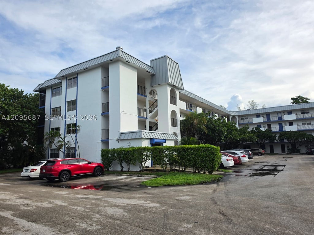 Photo of 5961 N Falls Cir Dr #109, Lauderhill, FL 33319 (MLS # A12095687)