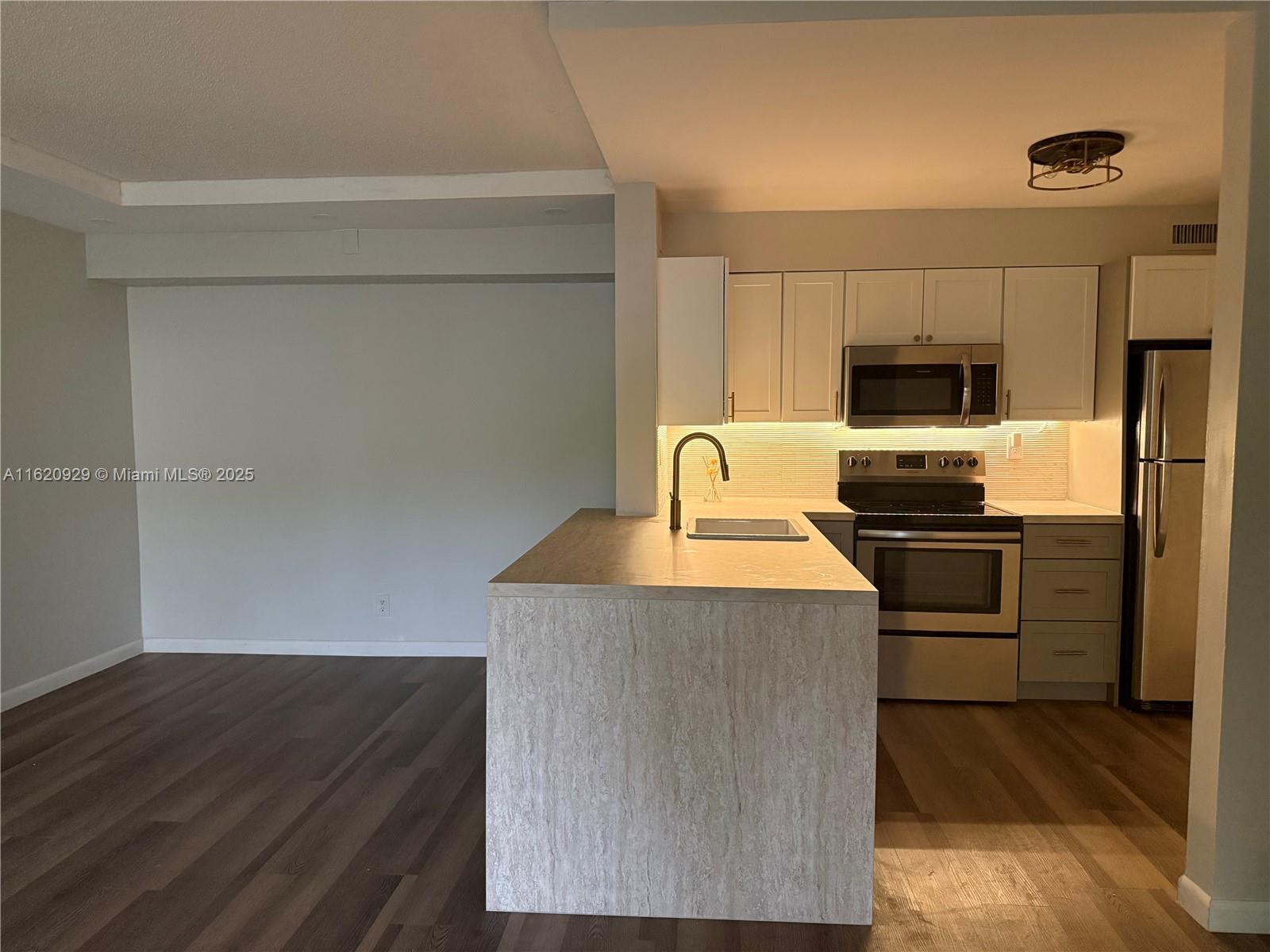 Completely Renovated Two Bedroom and one Bath. First Floor Private Corner Unit.
New kitchen Cabinet, New A/C, New Water Heater, New W/p Flooring
New Bathroom with double sinks, Celling fans
Easy Entrance from Parking Out Front, 1070 SQ FT of Spacious Living, Ample Storage, And Garden View Patio. Stainless Appliances, Laundry room in unit, all windows and door have an accordion shutter. QUIET AREA!!!
Amenities Include Clubhouse, Gym, and Newly Refreshed Pool. Pets Are Welcome.