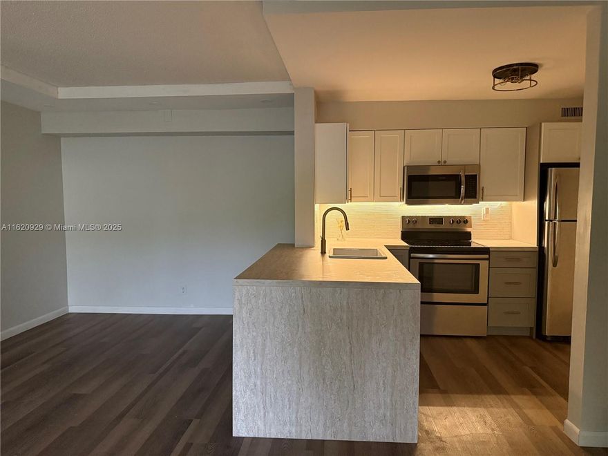 Completely Renovated Two Bedroom and one Bath. First Floor Private Corner Unit. 
New kitchen Cabinet, New A/C, New Water Heater, New W/p Flooring
 New Bathroom with double sinks, Celling fans 
 Easy Entrance from Parking Out Front, 1070 SQ FT of Spacious Living, Ample Storage, And Garden View Patio. Stainless Appliances, Laundry room in unit, all windows and door have an accordion shutter. QUIET AREA!!!
Amenities Include Clubhouse, Gym, and Newly Refreshed Pool. Pets Are Welcome.