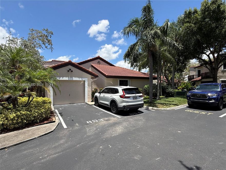 OPEN HOUSE 5/24 12:00 - 2PM - This is a rare opportunity to own a beautifully maintained, single-story end-unit townhome PRICED DEEPLY BELOW MARKET VALUE for a quick sale — submit your highest and best offer now, as all offers will be reviewed promptly. Situated on a corner cul-de-sac within a gated community, this 3-bedroom, 2-bathroom home enjoys exceptional privacy with technically no immediate neighbors on either side. The open split floor plan features vaulted ceilings, tile floors, generous closet space, and a separate laundry room. The eat-in kitchen boasts newer appliances and wood cabinets, flowing seamlessly into a dedicated dining area, open living space, and a screened porch perfect for relaxing. The oversized primary suite is privately set apart from the other two bedrooms and includes its own bathroom and ample closet space.

Additional highlights include a 1-car garage, 2 assigned parking spaces, and accordion shutters for peace of mind. Community amenities feature a pool, playground, basketball court, and event room, all with low HOA fees that also cover roof replacement and repairs. Conveniently located minutes from top restaurants and shopping, this move-in ready home checks every box. Do not miss this one.