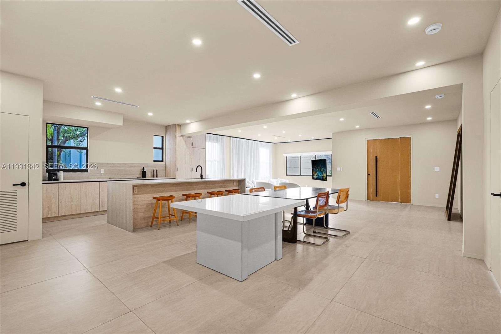 View photos, virtual tours, details... 4721 NW 6th Ave