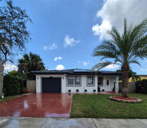 Photo of 1176 NW 29th Way, Fort Lauderdale, FL 33311 (MLS # A11851407)