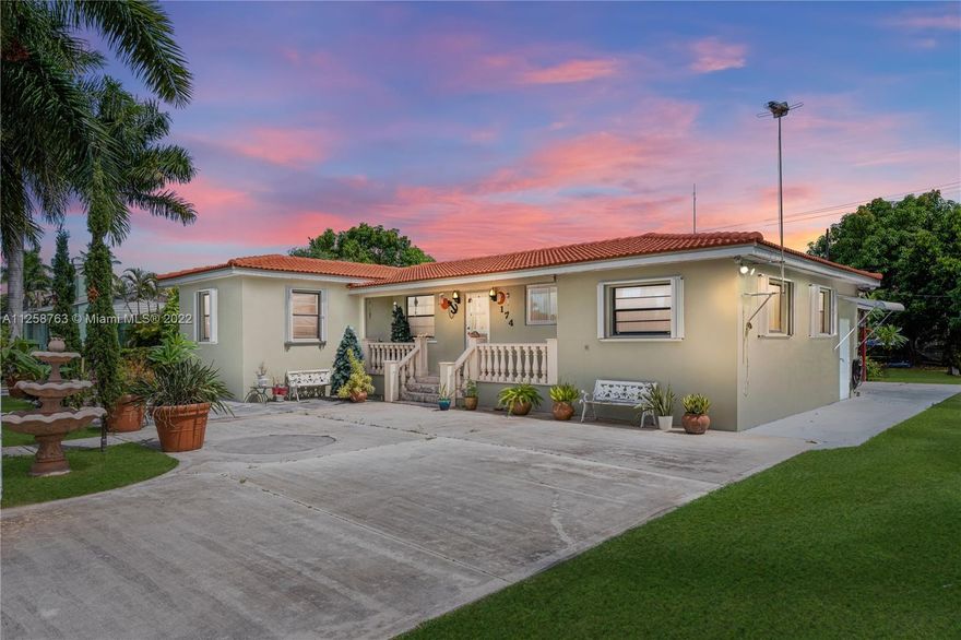 3bed/2baths single family home without HOA nestled on 13,500sqft lot. Completely fenced in property with covered patio, private backyard turn into private oasis with mature tropical trees great for cookouts and entertaining. Plenty of space for a pool, boat, park multiple trucks and RVS. Home features lost of natural light, some impact windows and impact doors, accordion shutters, Brazil cherry wood floors, tile floors, wood cabinet kitchen with granite countertops, vaulted ceiling with wood exposed beams, decorative fireplace, updated bathroom, laundry area, updated PVC plumbing thought, tankless water heater, updated electrical panel, sprinkler system with water well and pump. Located 2 blocks west from Krome Ave, across the street from MAST Homestead A- rated magnet school.Welcome home!