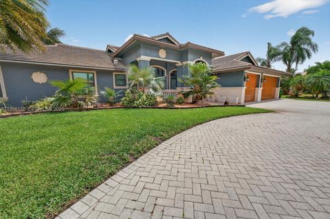 Photo of 4120 SW 106th Ter, Davie, FL 33328 (MLS # A11996178)