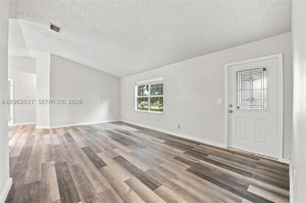 Photo of 1617 SW Hampshire Ln, Port St Lucie, FL 34953 (MLS # A12062517)