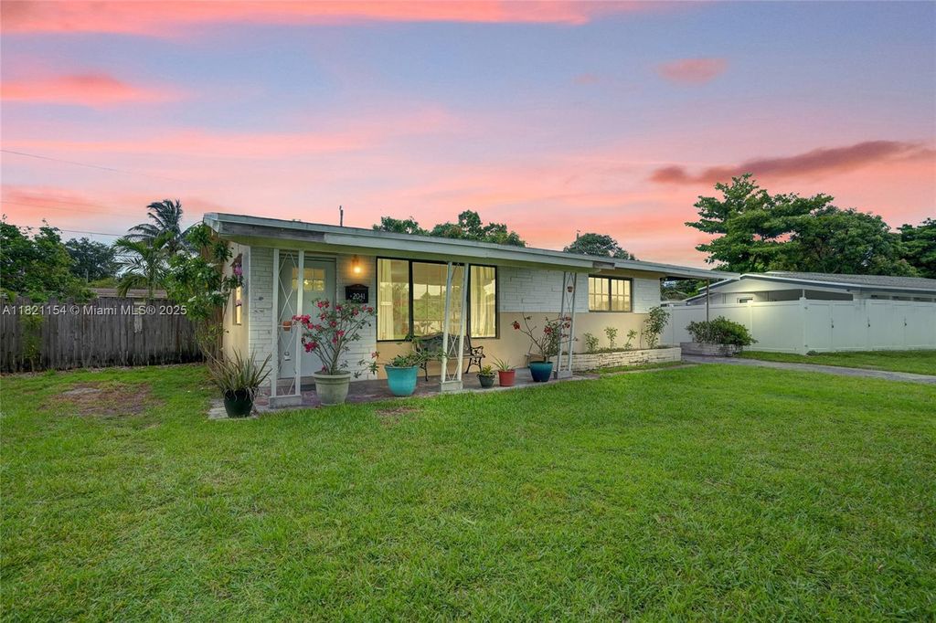 Photo of 2041 Arcadia Dr, Miramar, FL 33023 (MLS # A11821154)