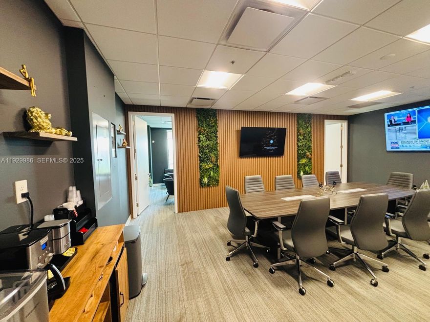 Modern, well-maintained office suite featuring private offices, a conference room, open work areas, and a welcoming reception space. Neutral finishes, ample lighting, and professional layout. Ideal for administrative, professional, or corporate use.