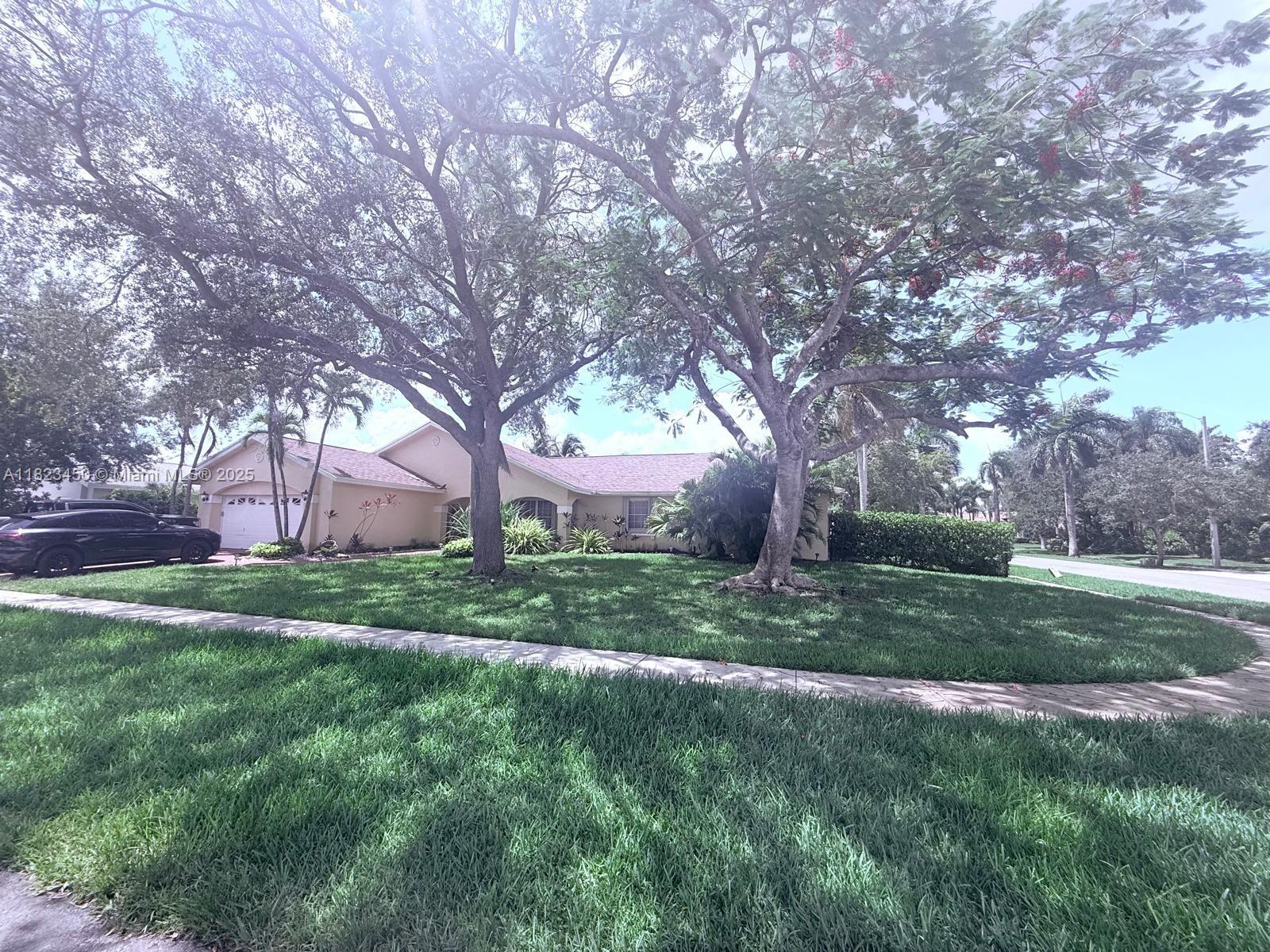 Spacious and beautifully maintained one-story home on a large corner lot in the desirable Pasadena 2 at Chapel Trail. This 4-bedroom, 2-bathroom residence features an open floor plan with a family room, living room, breakfast nook, and a two-car garage. The kitchen is equipped with granite countertops. Enjoy a generous primary suite with walk-in closets, tile flooring throughout, and a large backyard with a ground pool—perfect for entertaining! Outdoor lighting adds to the charm of this quiet, family-friendly neighborhood. Conveniently located near top-rated schools, shopping, dining, and entertainment. Pool and lawn maintenance included will be the tenant's responsibility. ! Don’t miss out—apply today!