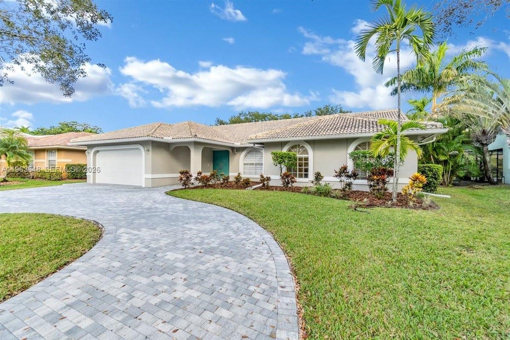 Photo of 10425 NW 48th Mnr, Coral Springs, FL 33076 (MLS # A11963648)