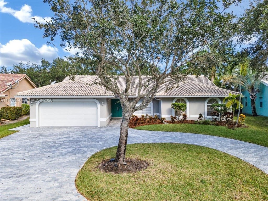 Photo of 10425 NW 48th Mnr, Coral Springs, FL 33076 (MLS # A11963648)