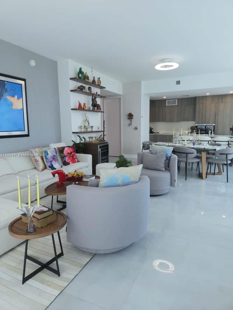 Luxury 2-bed/2 and half bath unit with ocean and city views. The unit has 1,675 square feet (largest floor plan for a 2/2.5 unit) with state-of-the-art designer finishes, custom closets, exquisite upgrades by local modern designer, ceiling fans, private foyer and elevator. Exclusive boutique building with spectacular amenities such as gym, pool, sauna, pet friendly building, and children's playroom. Excellent location, walking distance to the beach, with beach access via the DoubleTree by Hilton hotel (included with the rent). Excellent restaurants in the​​‌​​​​‌​‌​​​‌‌​​​‌‌‌​​‌​​‌‌​​​​ area.