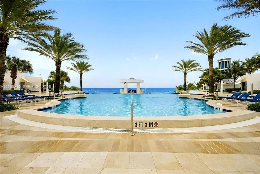 This Luxury apartment is an exceptional opportunity at the prestigious Ocean Palms. Perched on the 30th floor, residence 3003 offers one of the largest and most desirable floor plans in the building, featuring an expansive 3,466 S/F of interior living space plus an extraordinary 557 square feet of wrap-around balconies.
Ideally located within walking distance restaurants ,synagogue, and everyday shopping(Publix across),this residence also offers direct, private beach access, providing the ultimate beachfront lifestyle with both convenience and privacy. In addition, there is a rare & unique opportunity: unit has 4 assigned parking spaces(close to entrance and elevators), which is not typical to any other unit.
This elegant residence offers three bedrooms plus a spacious den that can easily serve as a fourth bedroom, along with three and one-half bathrooms. Designed for both comfort and entertaining, the open and flowing layout is filled with natural light and showcases breathtaking views from nearly every room.
Enjoy two oversized balconies with northeast and southeast exposures, capturing sweeping ocean views by day and stunning Intracoastal and city lights by night—a rare and highly sought-after combination.
Set within one of the area’s most luxury, full-service beachfront buildings, this high-floor residence delivers a truly unique opportunity to own a premier home with space, views, and versatility that are rarely available in Ocean Palms.