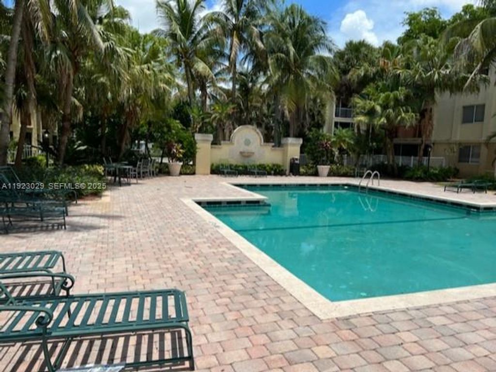 Photo of 5780 Rock Island Rd #370, Tamarac, FL 33319 (MLS # A11923029)