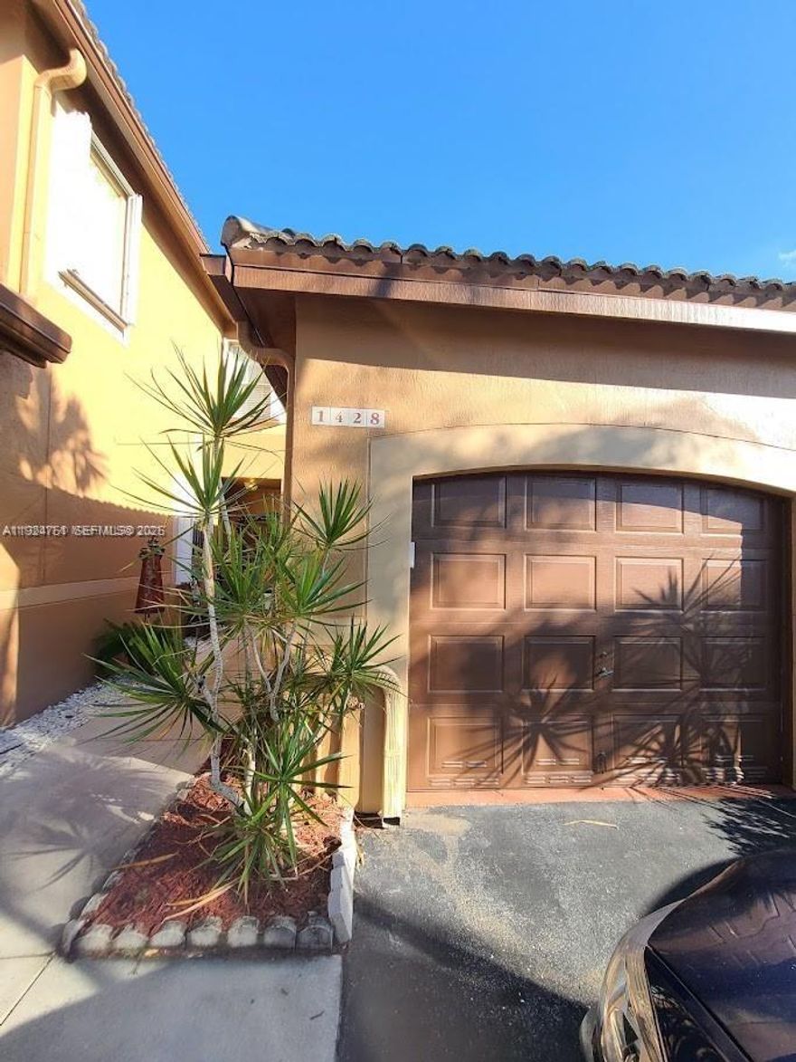 Beautiful 2-bedroom, 1.5-bath townhouse in the heart of Weston. Features vinyl flooring, washer & dryer, bright open kitchen/living area, and a spacious patio. Includes 1-car garage + driveway. Screened patio to enjoy it. Community offers pool and peaceful surroundings. Great School in Weston School District!  A great opportunity you don’t want to miss!