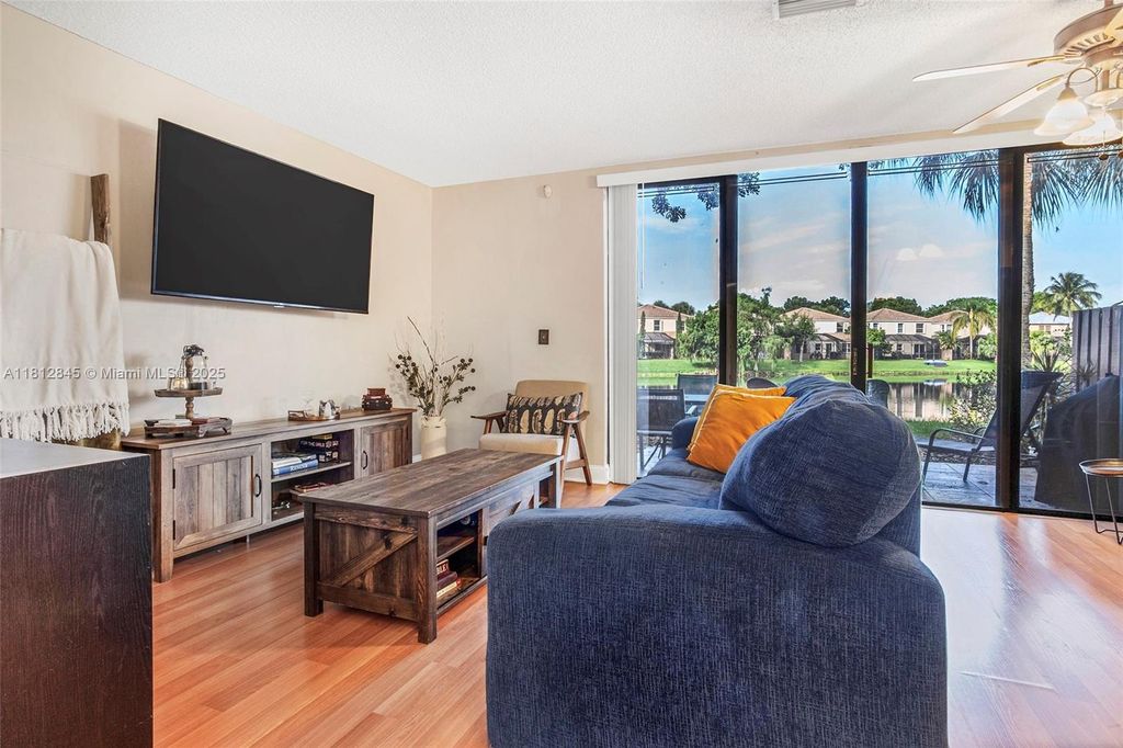 Photo of 10630 NW 14th St #115, Plantation, FL 33322 (MLS # A11812845)