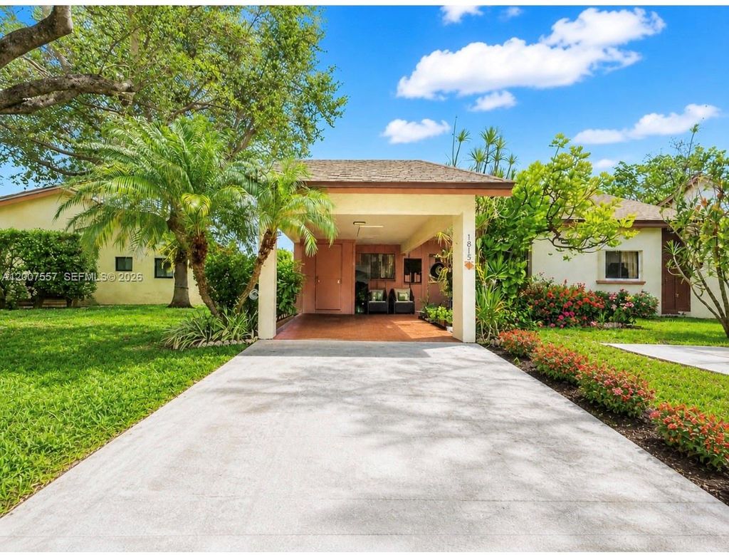 Photo of 1815 Tamarind Ln, Coconut Creek, FL 33063 (MLS # A12007557)