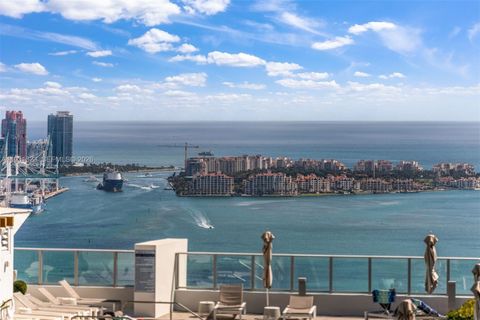 1000 Brickell Plz PH5203 Miami FL 33131